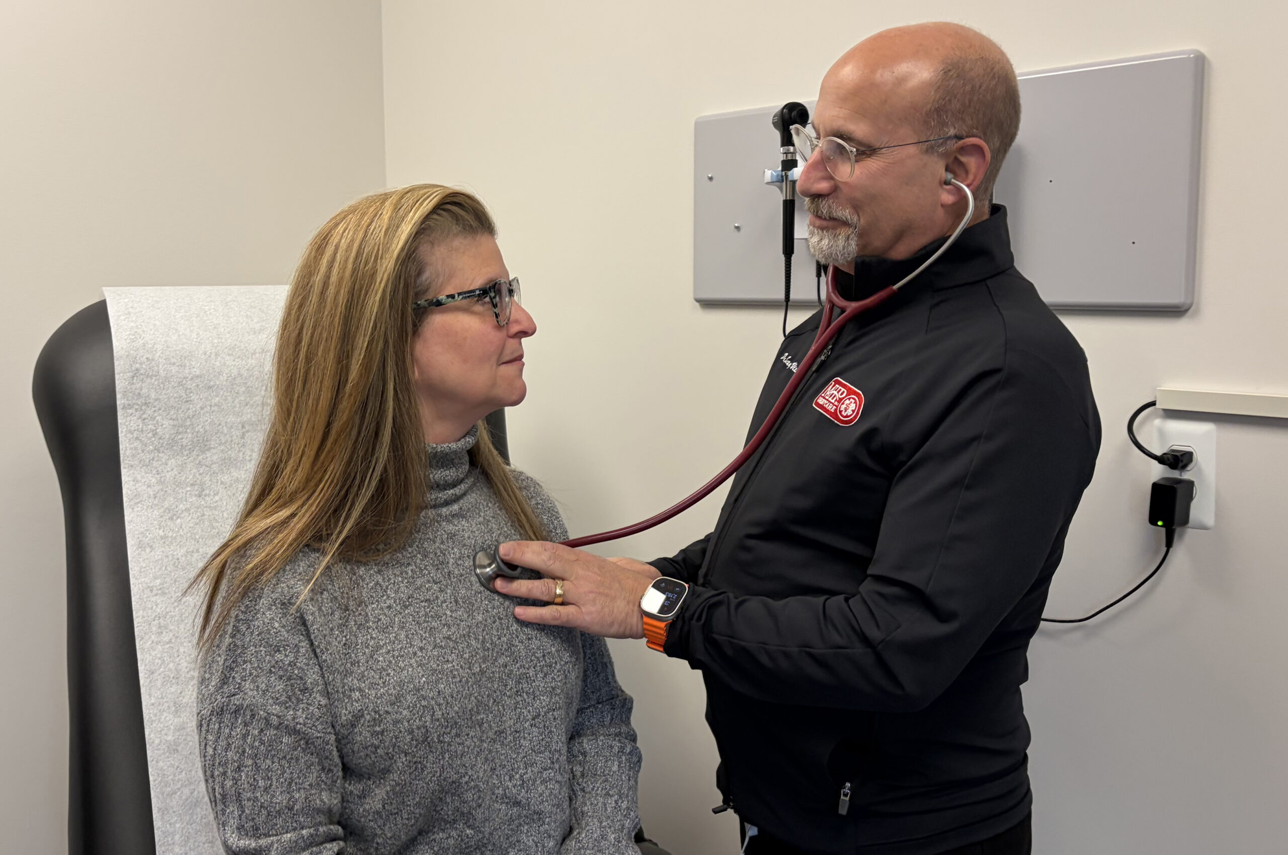 Dr Sanford Vieder with a patient - MHP Urgent Care