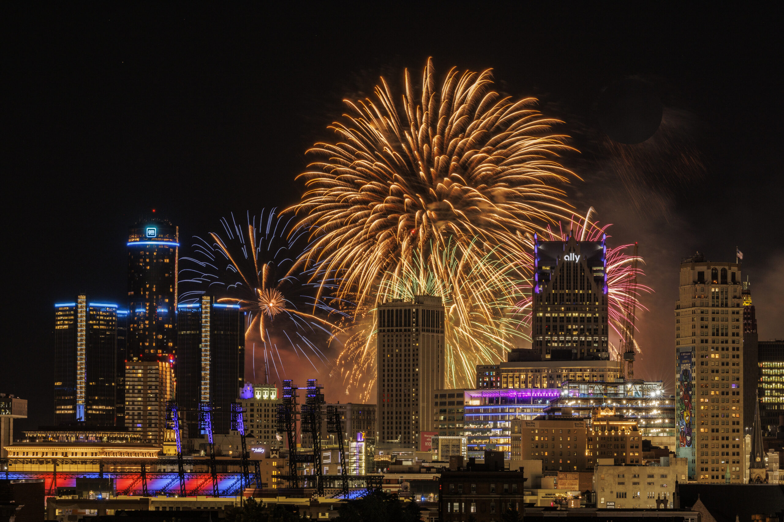 The Fireworks show in Detroit is an awe-inspiring spectacle that captivates both locals and visitors alike. As the sun sets over the majestic Detroit River, the sky comes alive with an explosion of vibrant colors and mesmerizing pyrotechnics. The meticulously choreographed display illuminates the city's iconic skyline, showcasing the rich history and culture of Detroit. Families gather along the riverfront, filled with anticipation and excitement, as the rhythmic symphony of fireworks dances across the night sky, creating a breathtaking symphony of light. The Ford Fireworks show in Detroit is a cherished tradition, celebrating community, unity, and the spirit of this great city.